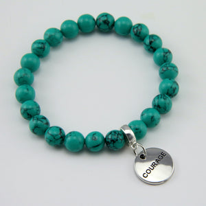 Teal coloured stone bead bracelet with silver meaningful word charm.