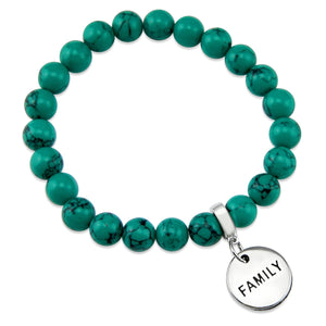 Teal coloured stone bead bracelet with silver meaningful word charm.