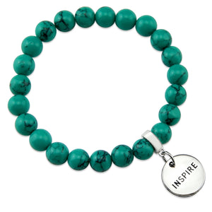Teal coloured stone bead bracelet with silver meaningful word charm.