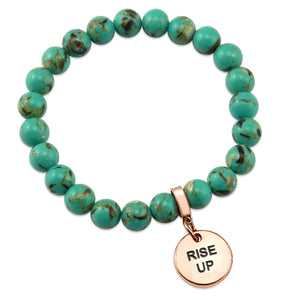 Light teal stone bead bracelet with rose gold meaningful word charm.