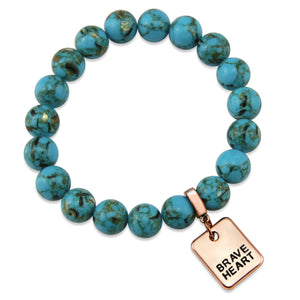 Teal coloured stone bracelet with word charm and rose gold clip.