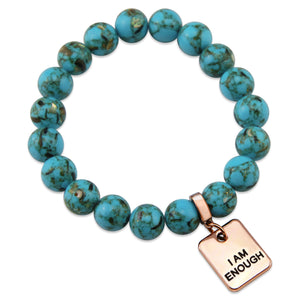 Teal coloured stone bracelet with word charm and rose gold clip.