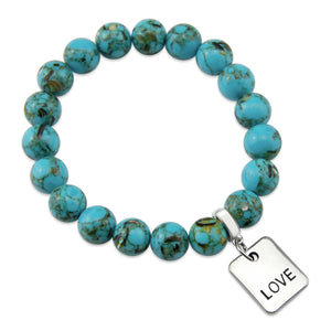 Teal coloured stone bracelet with word charm and silve r clip.