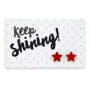 Red glitter star acrylic earring studs with hypoallergenic posts on keep shining posts.