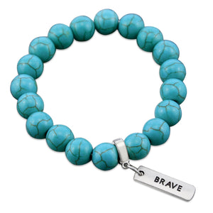 Turquoise stone bead bracelet with silver charms with meaningful words.