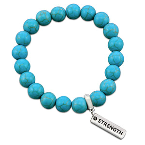 Turquoise stone bead bracelet with silver charms with meaningful words.