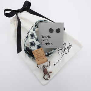 Earring set with packaging on a white background