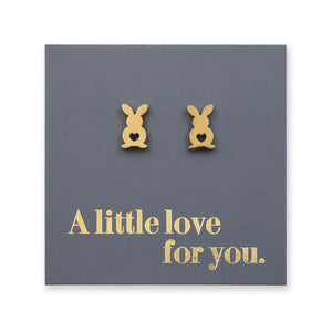 Gold bunny-shaped earrings on a gray card with 'A little love for you.' text.