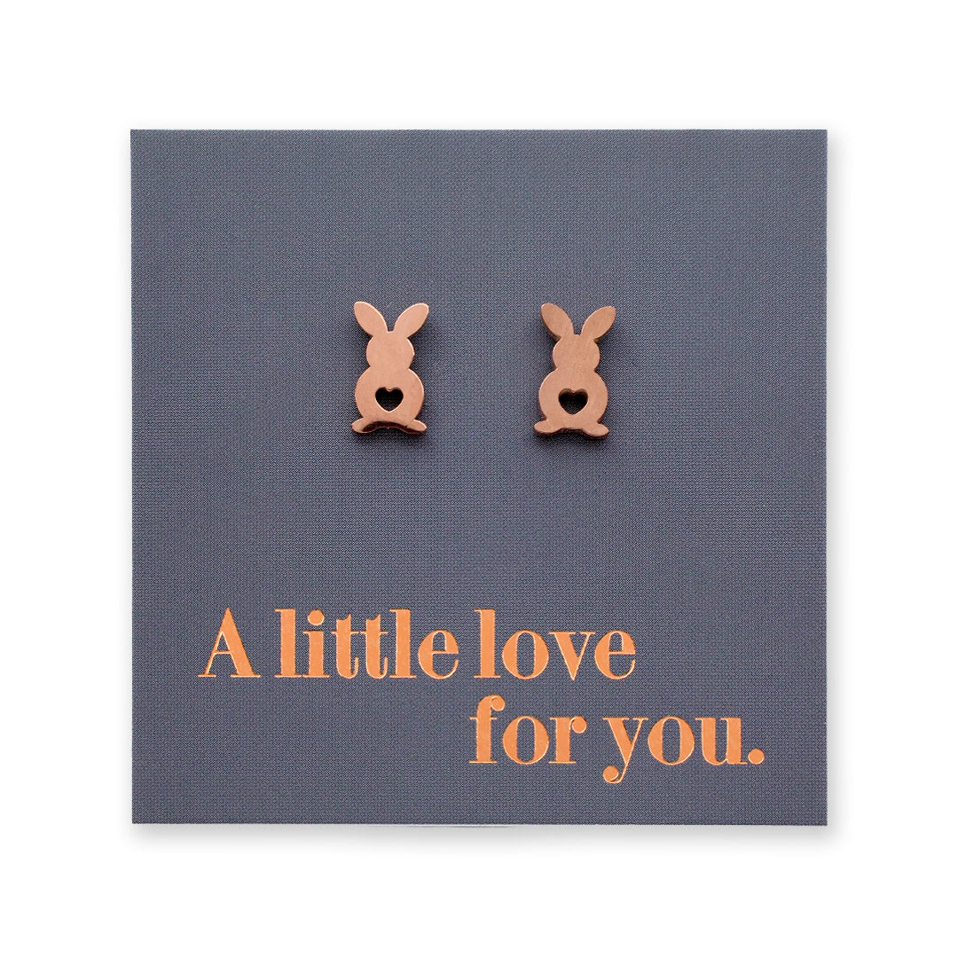 Bunny-shaped earrings on a card with 'A little love for you' text.