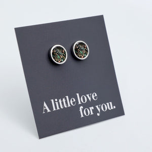 Pair of round earrings on a card with 'A little love for you' text