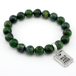 Green beaded bracelet with a silver tag reading 'Wild and Free' on a white background