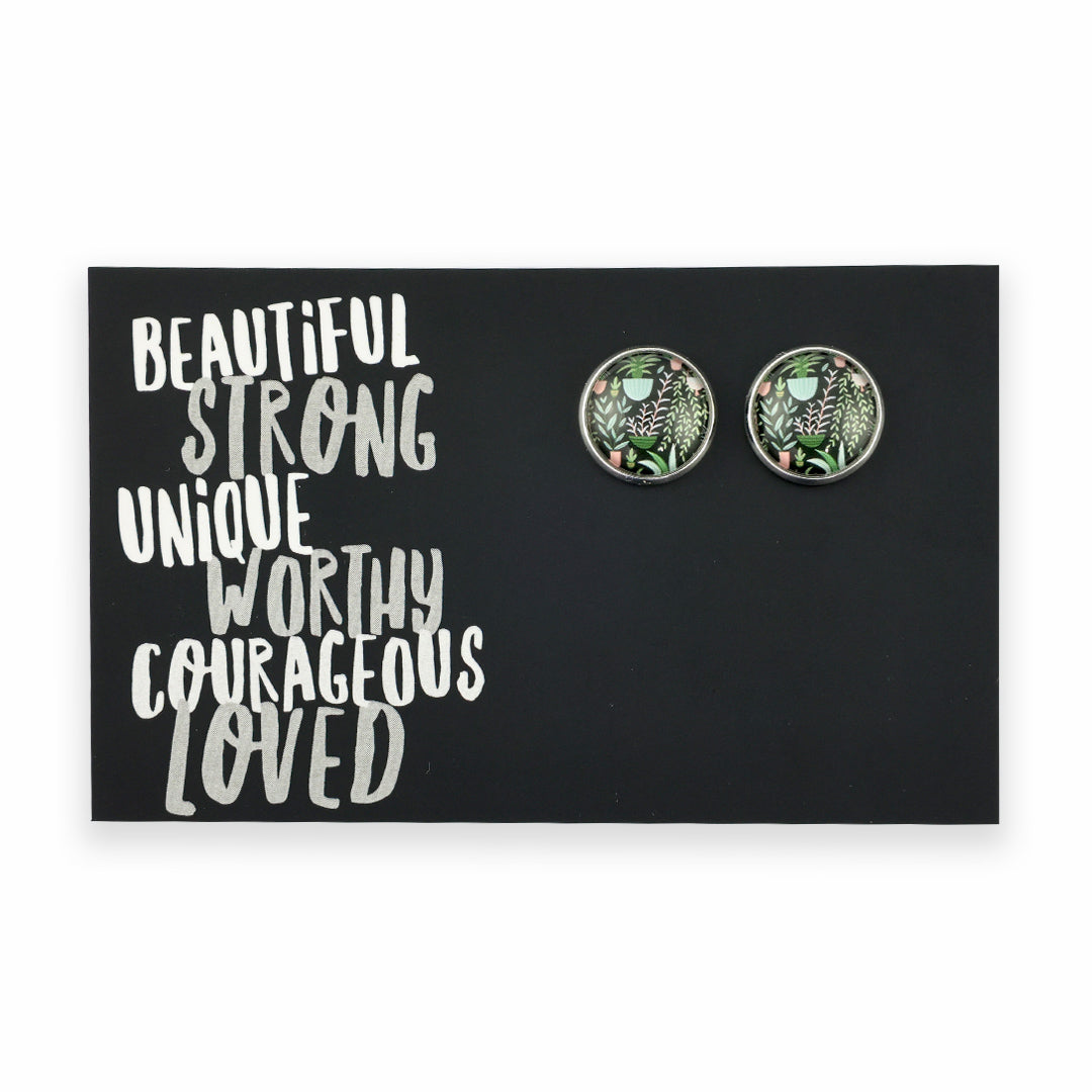 Pair of round earrings on a card with motivational text