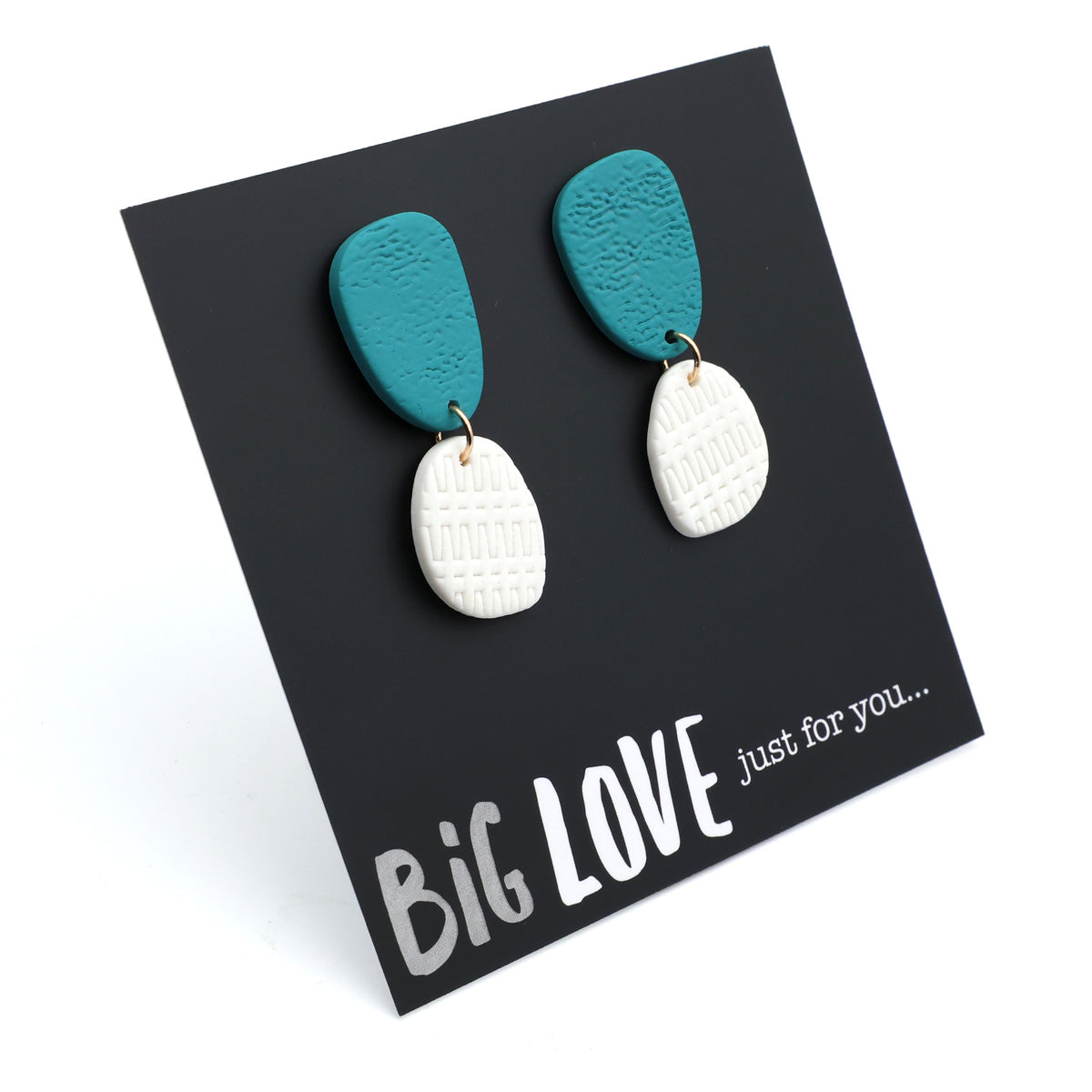Teal and white earrings on a 'Big Love just for you' card