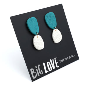 Teal and white earrings on a 'Big Love just for you' card