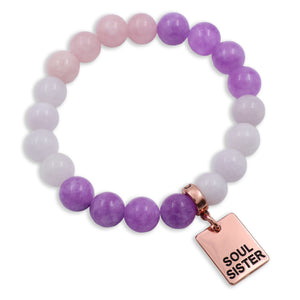 Multicolored beaded bracelet with a 'Soul Sister' tag on a white background