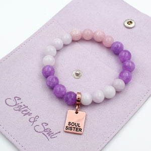Beaded bracelet with 'Soul Sister' tag on a purple card