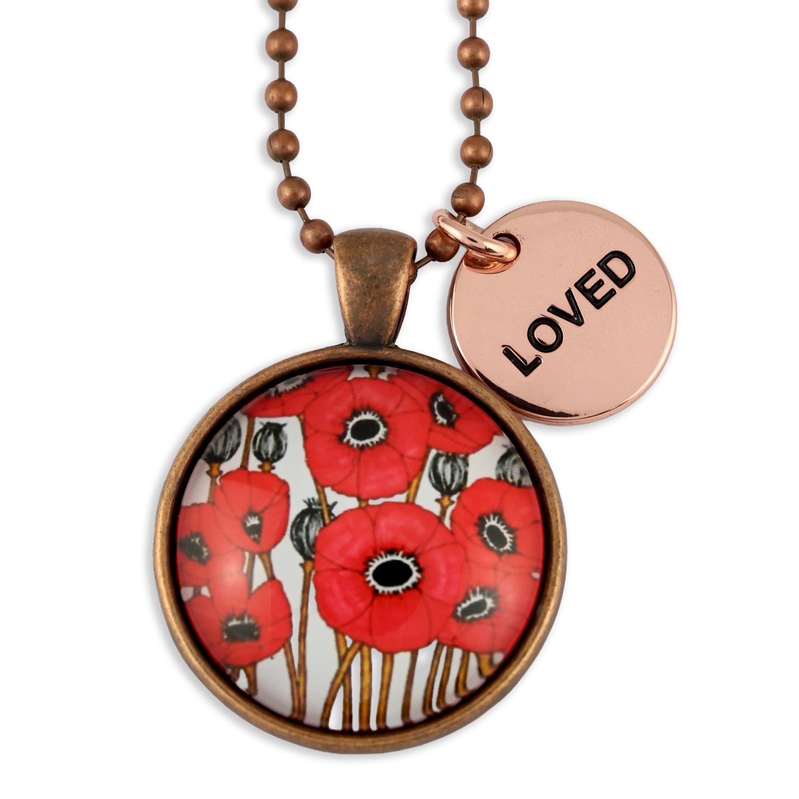 Necklace with a round pendant featuring red floral design and a round tag with 'LOVED' on a white background.