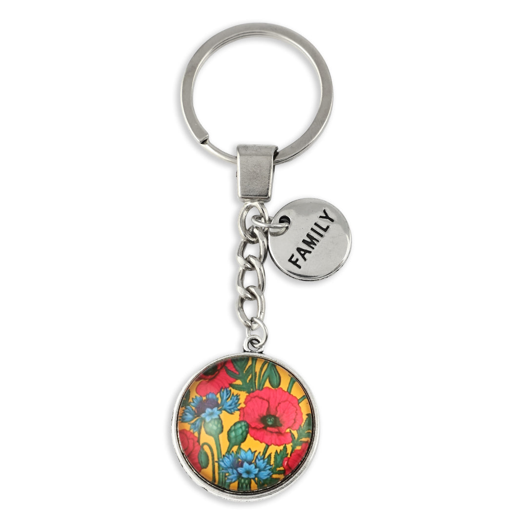 Keychain with floral design and 'I love family' tag on a white background