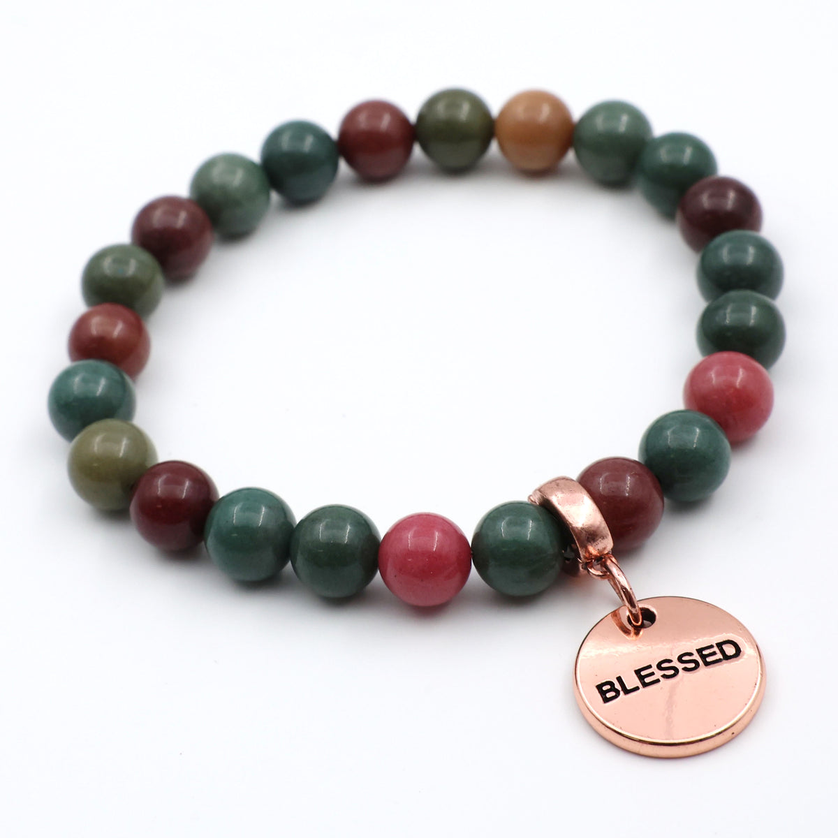 Beaded bracelet with a 'Blessed' charm on a white background
