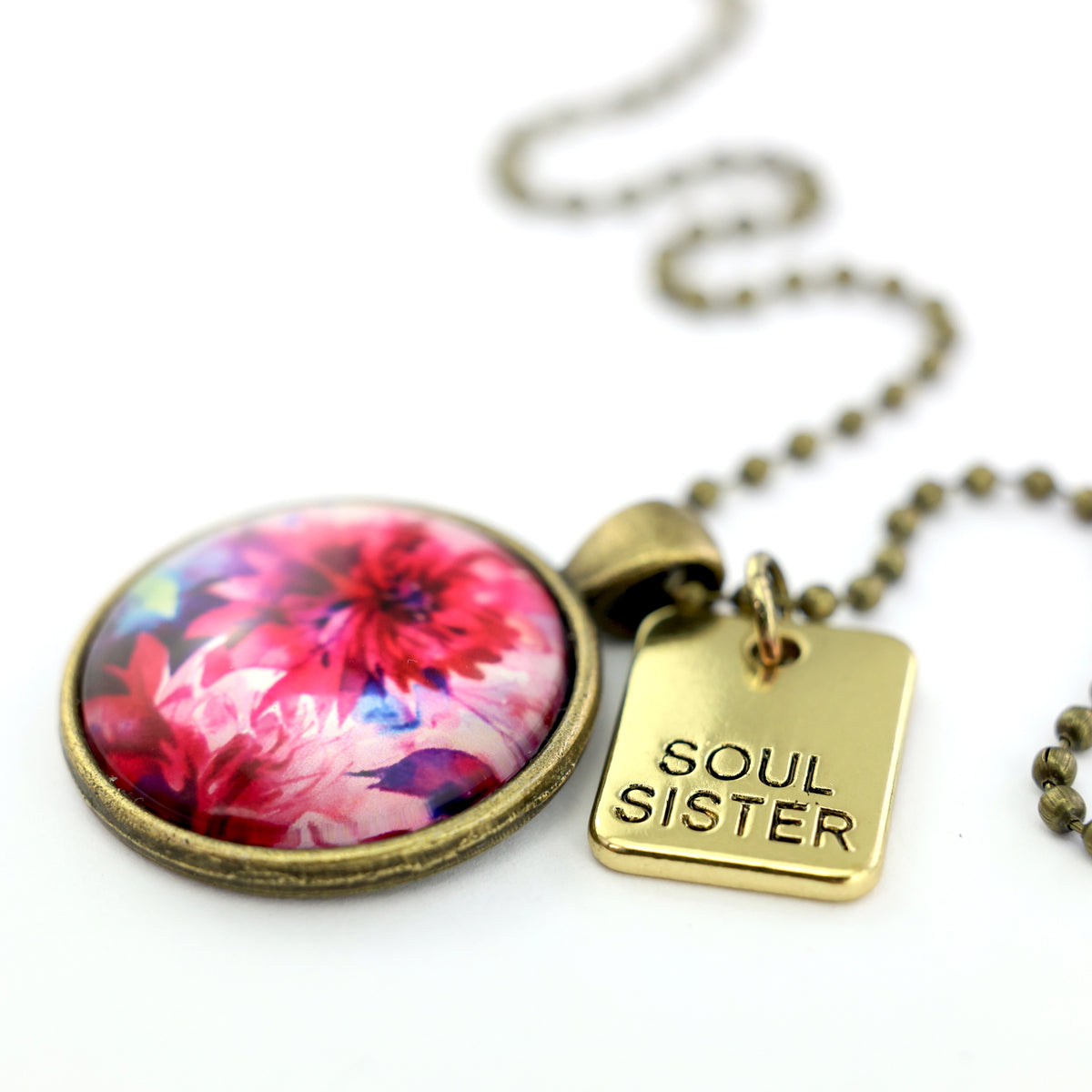 Pink floral print vintage gold circle pendant necklace with 'soul sister' charm. A product that fundraises for the National Breast Cancer Foundation. 