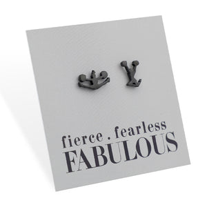 Cheer leader shaped earrings black on a grey card. 
