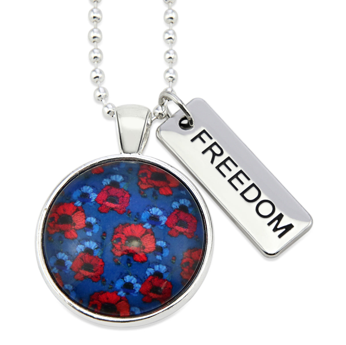 Necklace with floral pendant and 'FREEDOM' tag on a white background