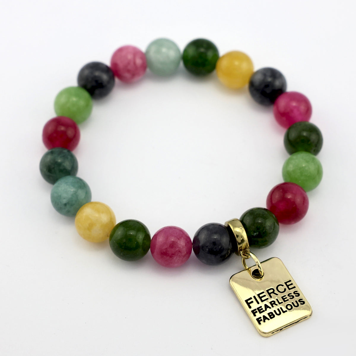 Multicolored beaded bracelet with a gold charm on a white background
