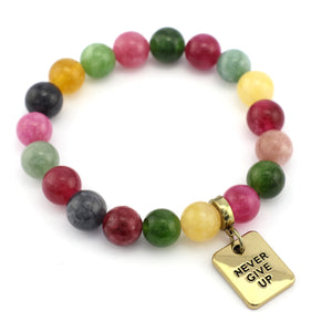 Multicolored beaded bracelet with a gold 'Never Give Up' charm on a white background