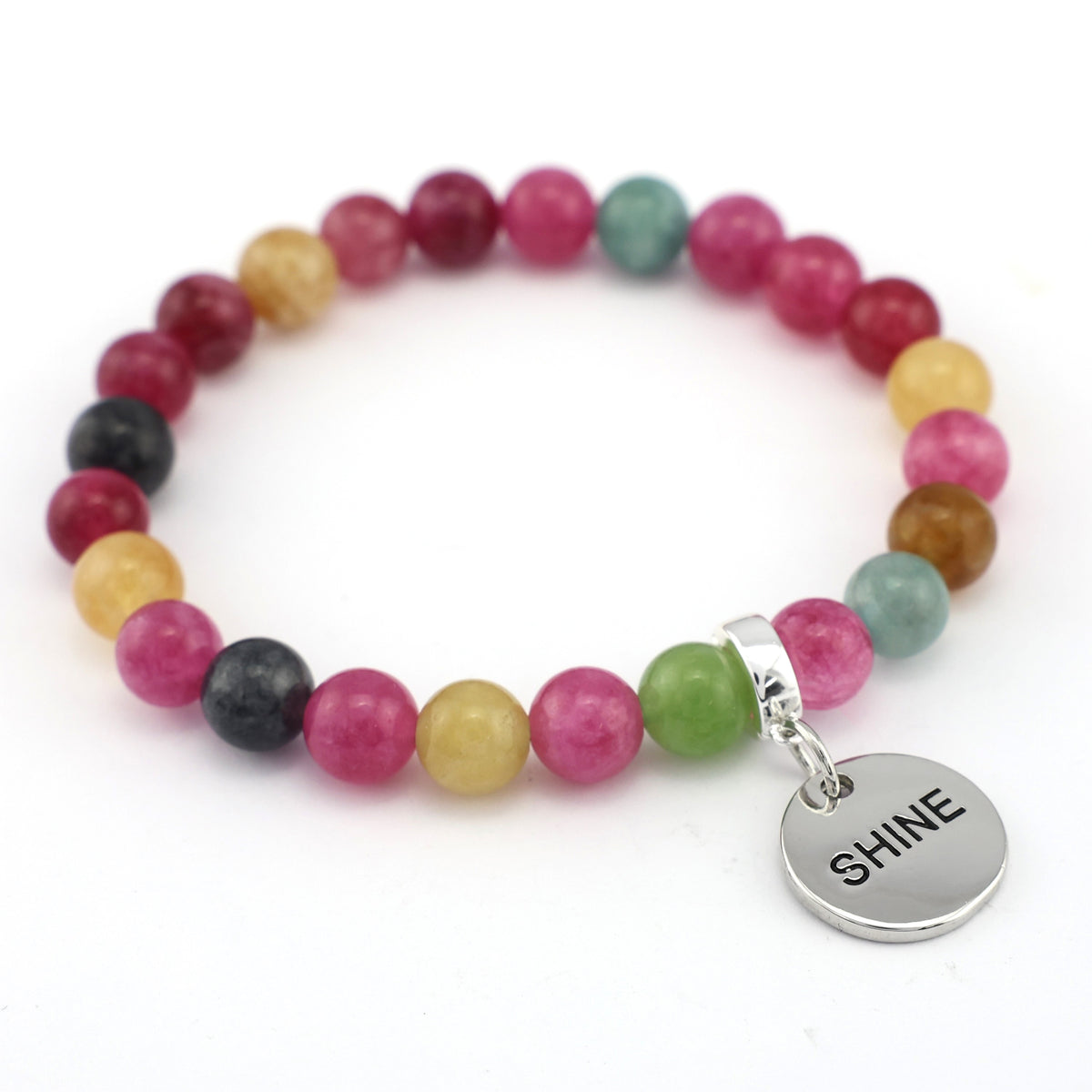 Multicolored beaded bracelet with a silver 'SHINE' charm on a white background