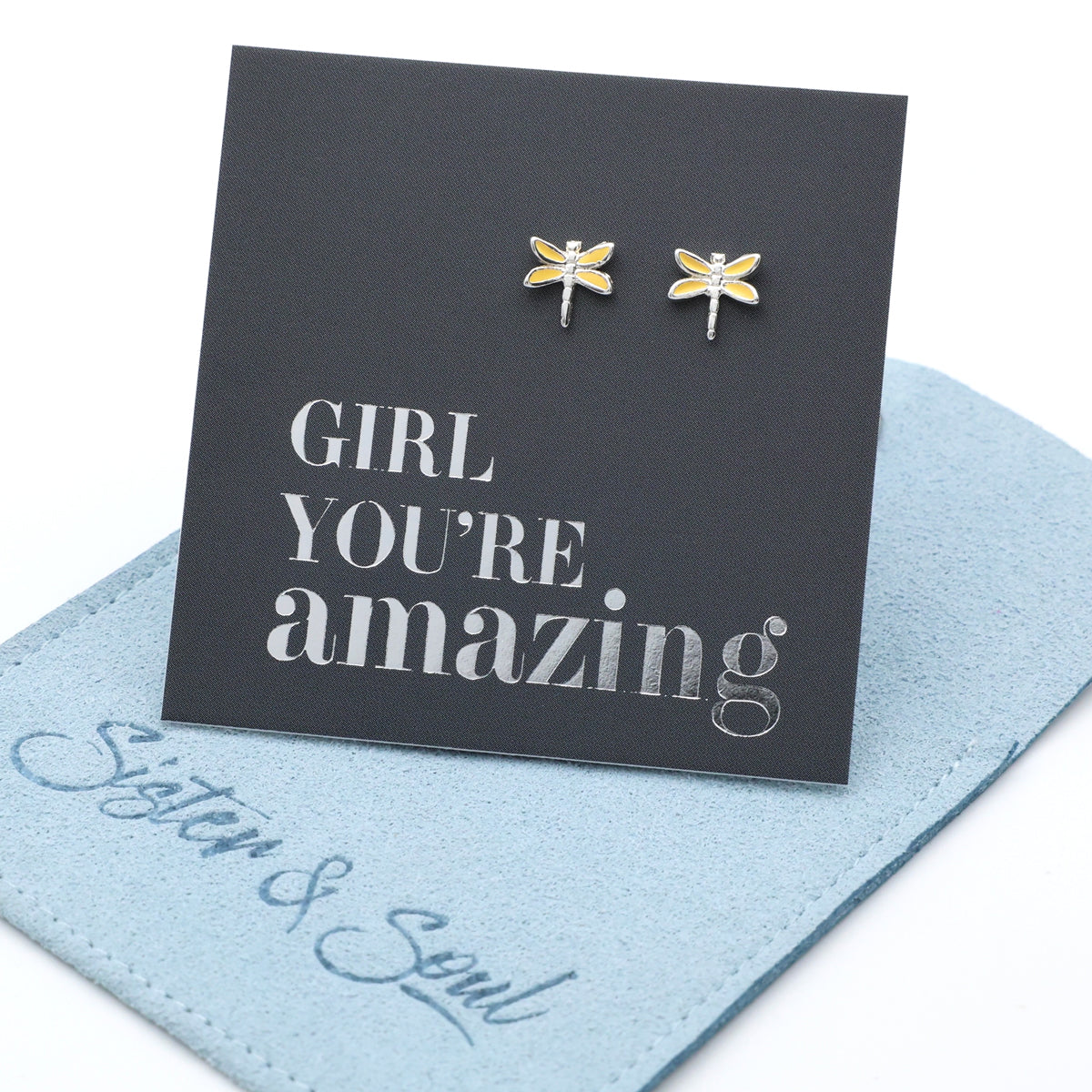 Dragonfly earrings on a card with 'Girl You're Amazing' text