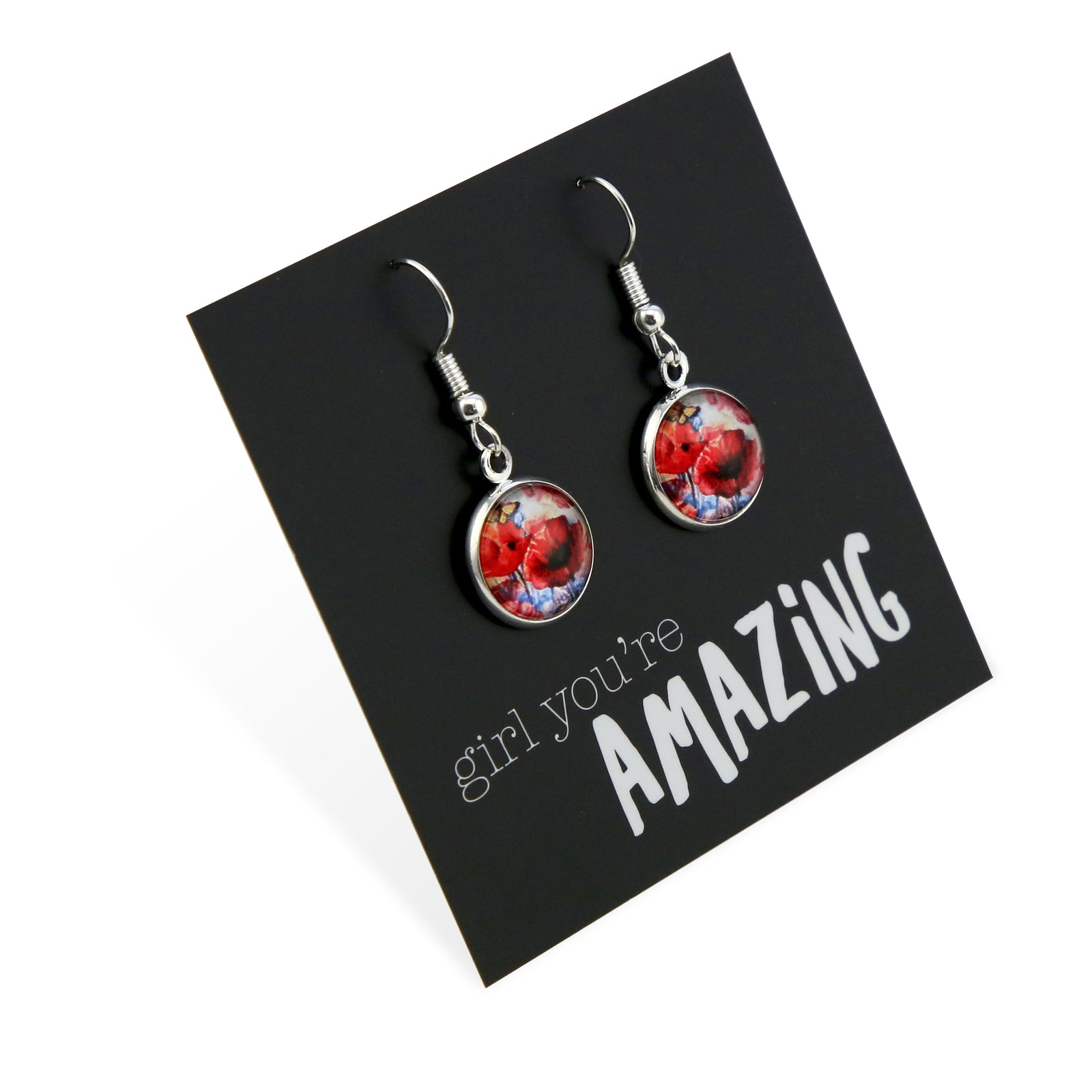Earrings with floral design on a card with 'girl you're amazing' text