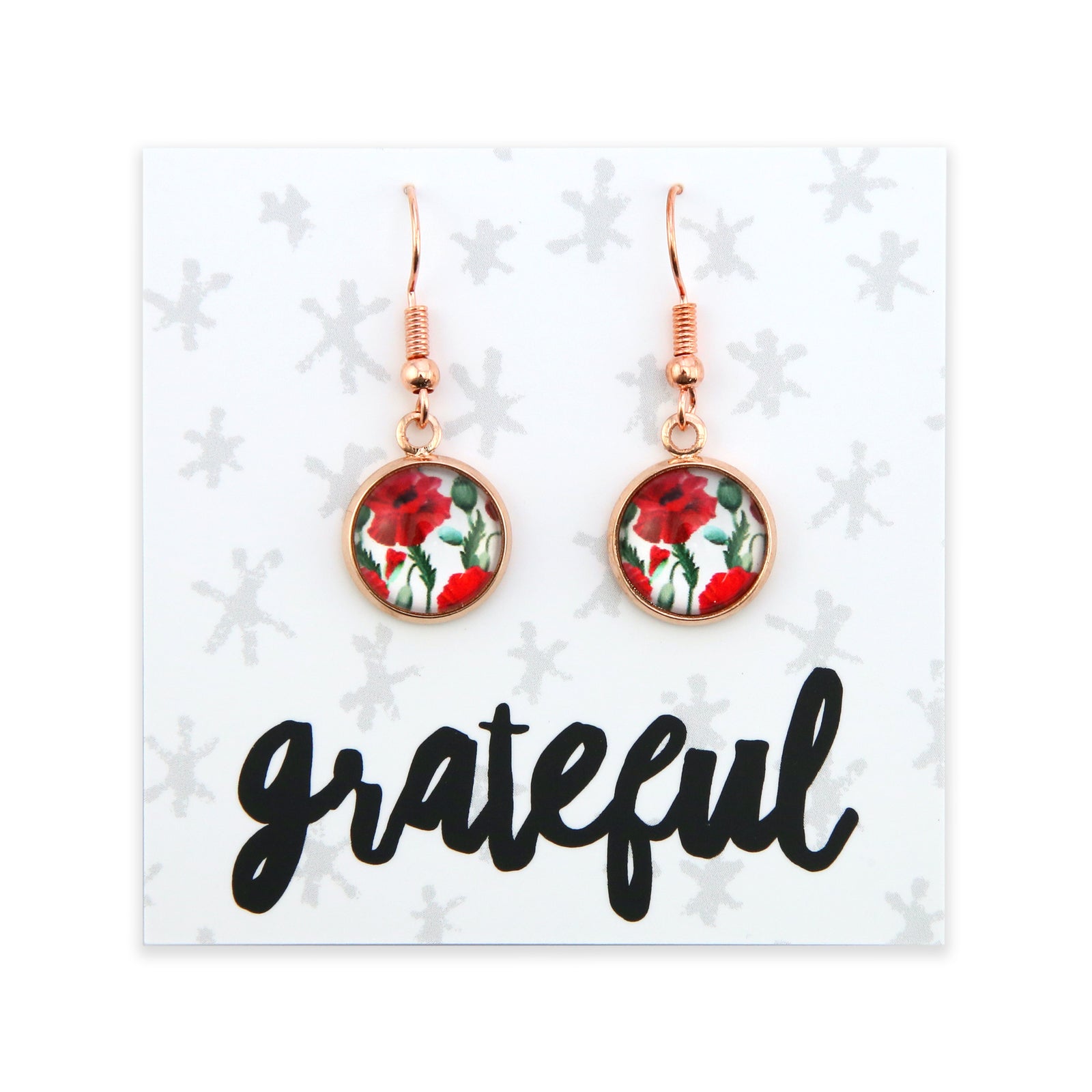 Floral earrings on a card with 'grateful' text