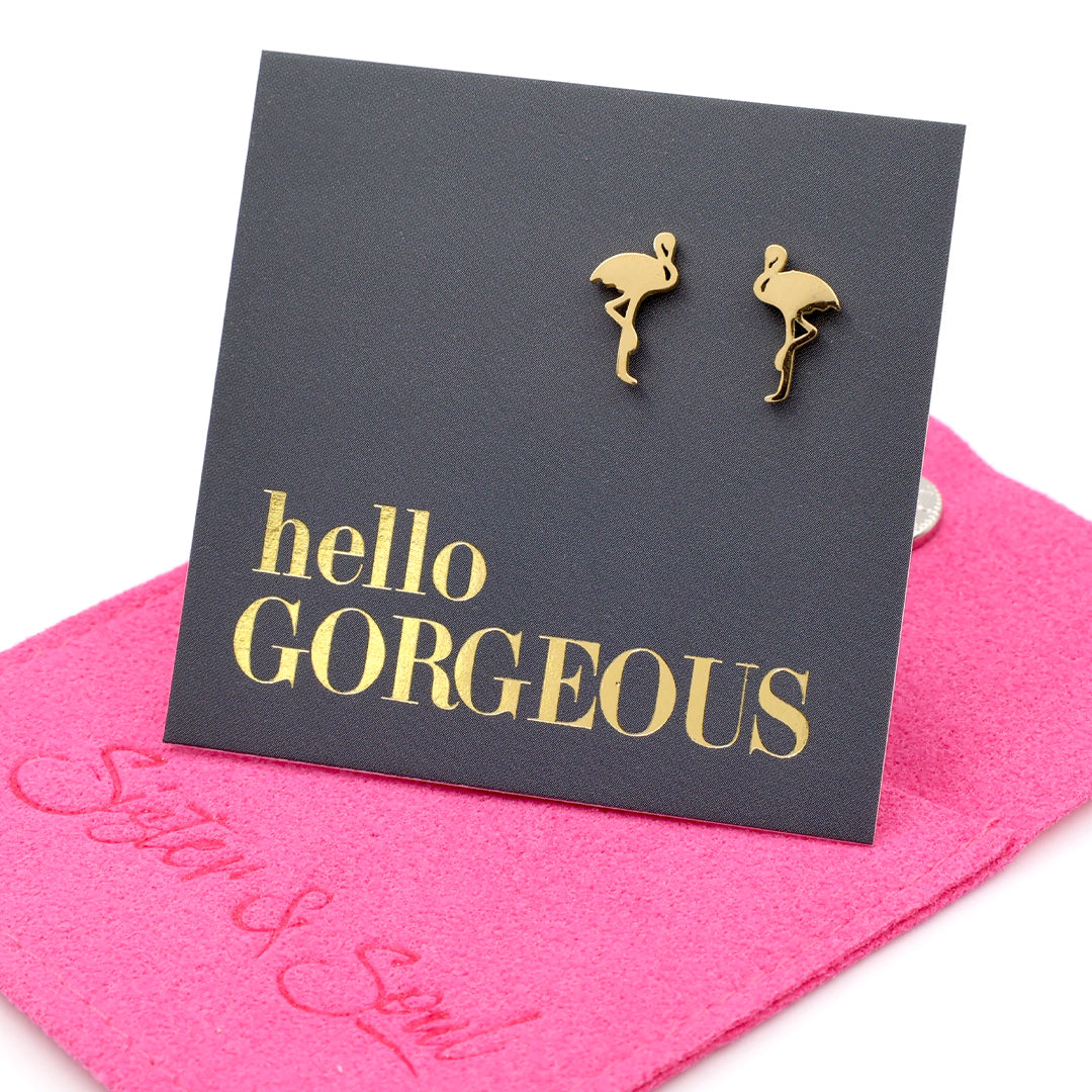 Flamingo shaped stainless steel earring studs on 'hello gorgeous' card on a hot pink card