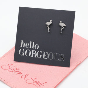 Flamingo shaped stainless steel earring studs on 'hello gorgeous' card on a pink pouch