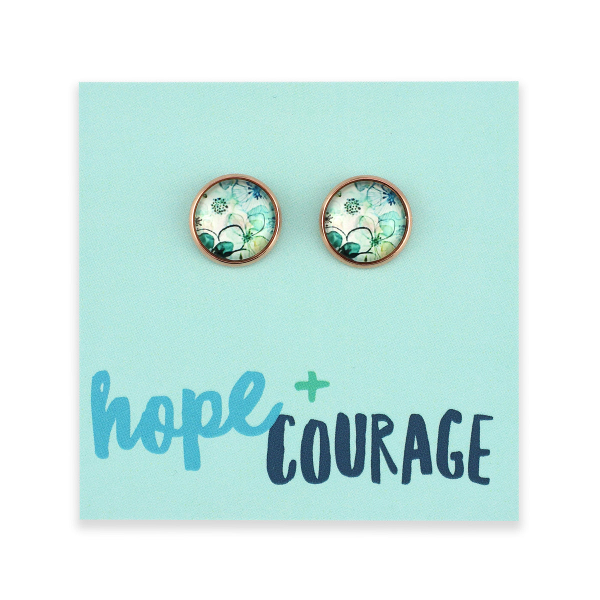 Pair of earrings on a card with 'hope + courage' text