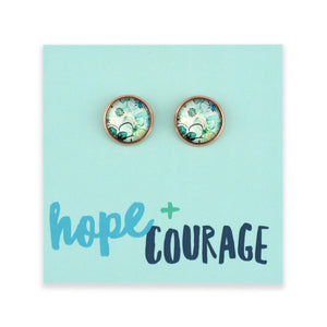 Pair of earrings on a card with 'hope + courage' text