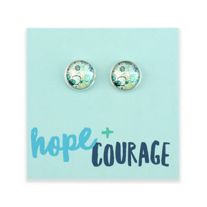 Pair of earrings on a card with 'hope + courage' text