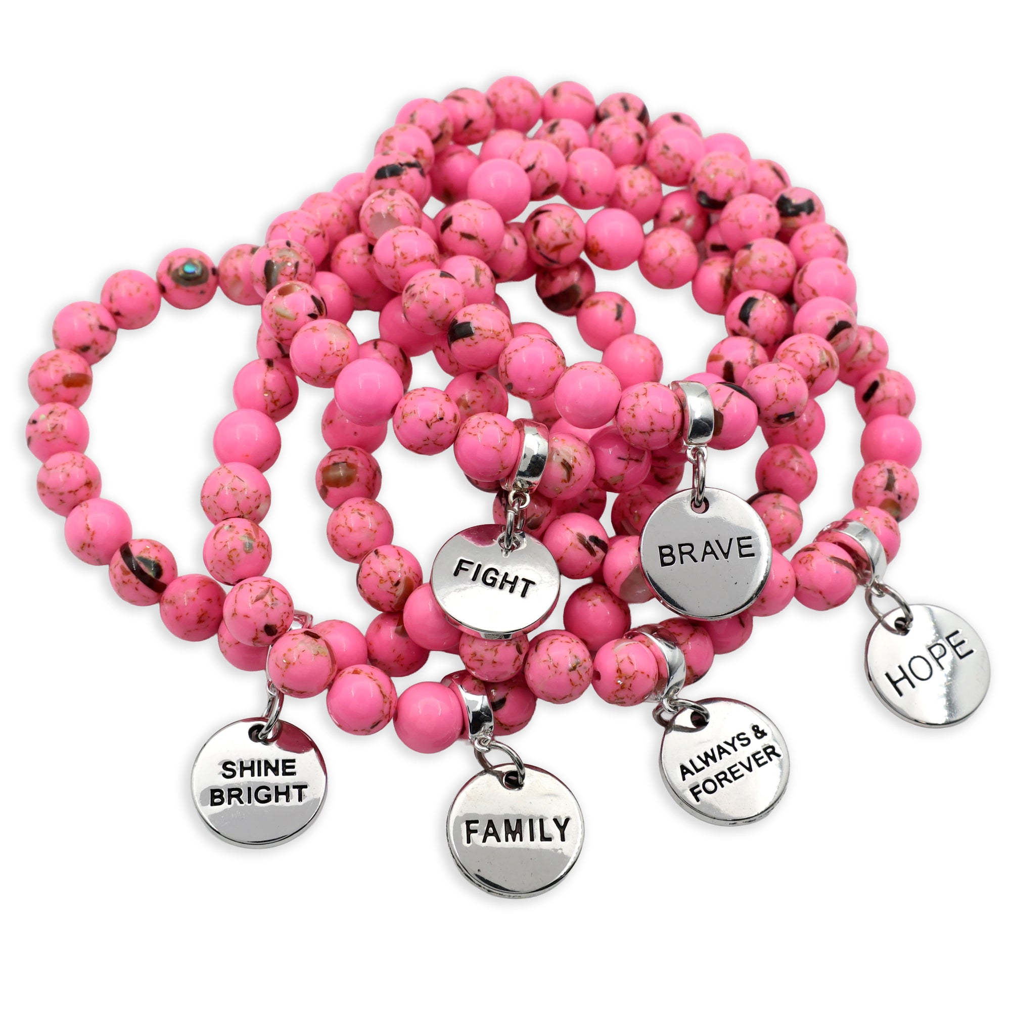 Pink beaded bracelet with silver charms on a white background