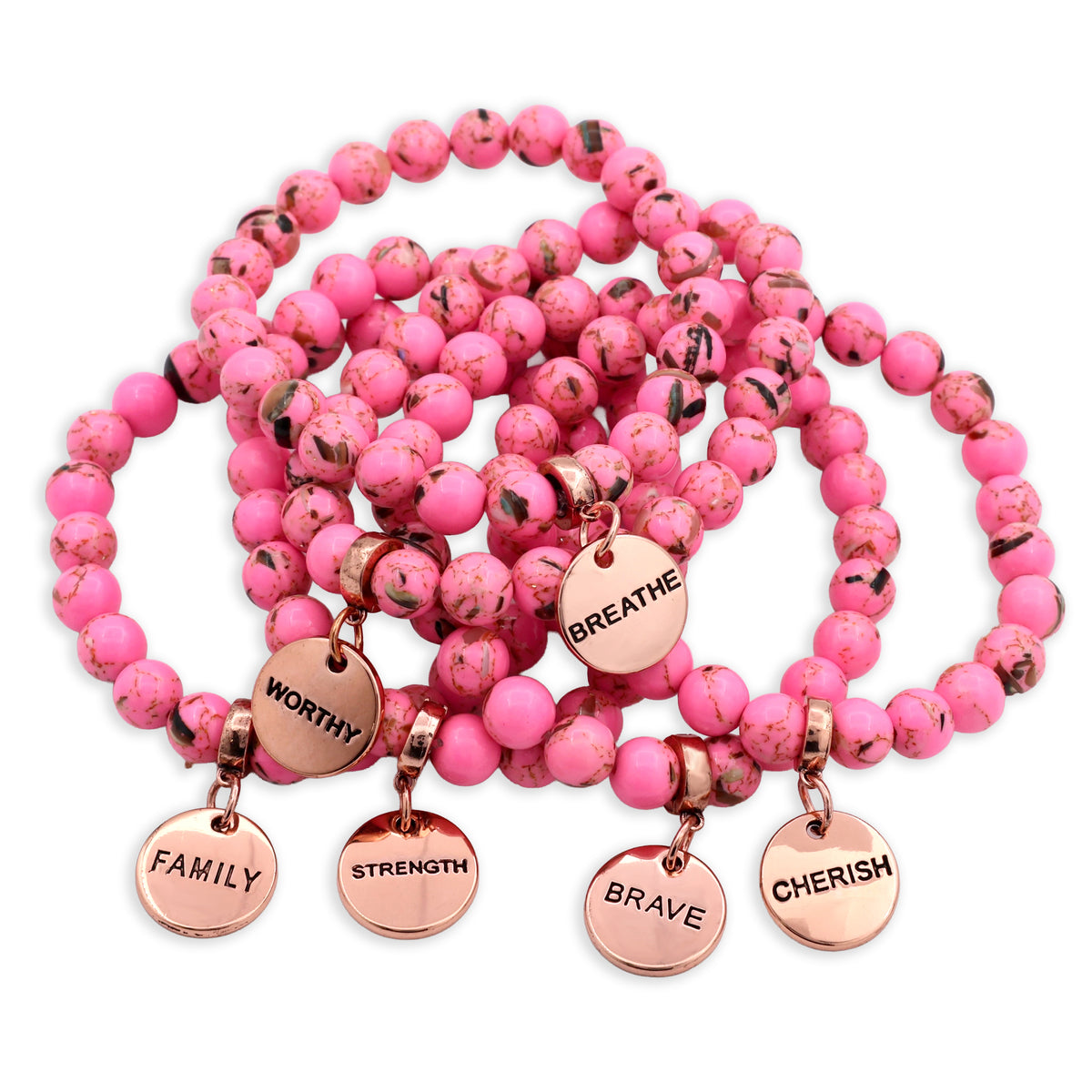 Pink beaded bracelets with rose gold charms on a white background
