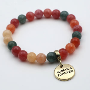 Multicolored beaded bracelet with a gold 'Always & Forever' charm on a white background