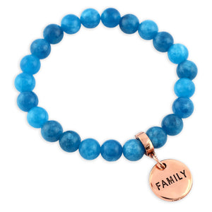 Blue beaded bracelet with a rose gold 'FAMILY' charm on a white background