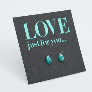 Turquoise earrings on a card with 'LOVE just for you...' text
