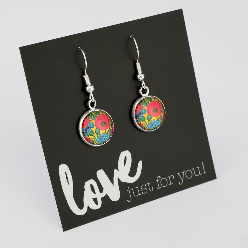 Colorful floral earrings on a black card with 'love just for you!' text