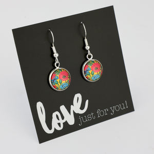 Colorful floral earrings on a black card with 'love just for you!' text