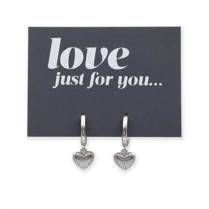 Silver shell-shaped earrings on a card with 'love just for you' text.