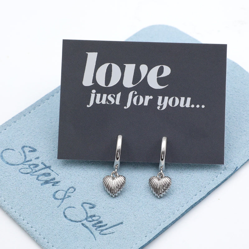Heart-shaped earrings on a 'love just for you' card with 'Sister & Soul' branding.