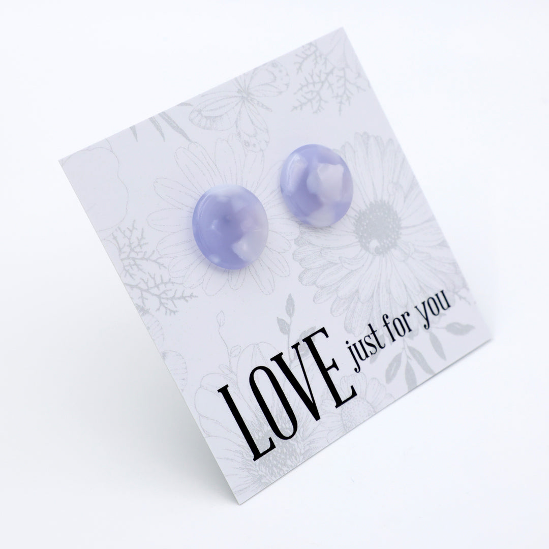 A pair of round lavender stud earrings displayed on a white floral backing card that reads 'LOVE just for you'.