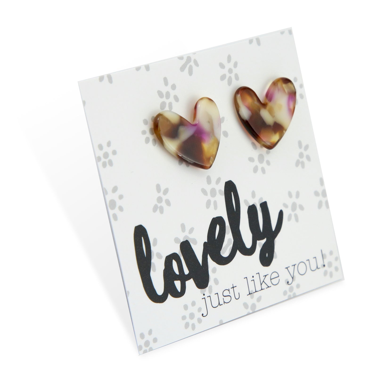 Heart-shaped earrings on a card with 'lovely just like you!' text