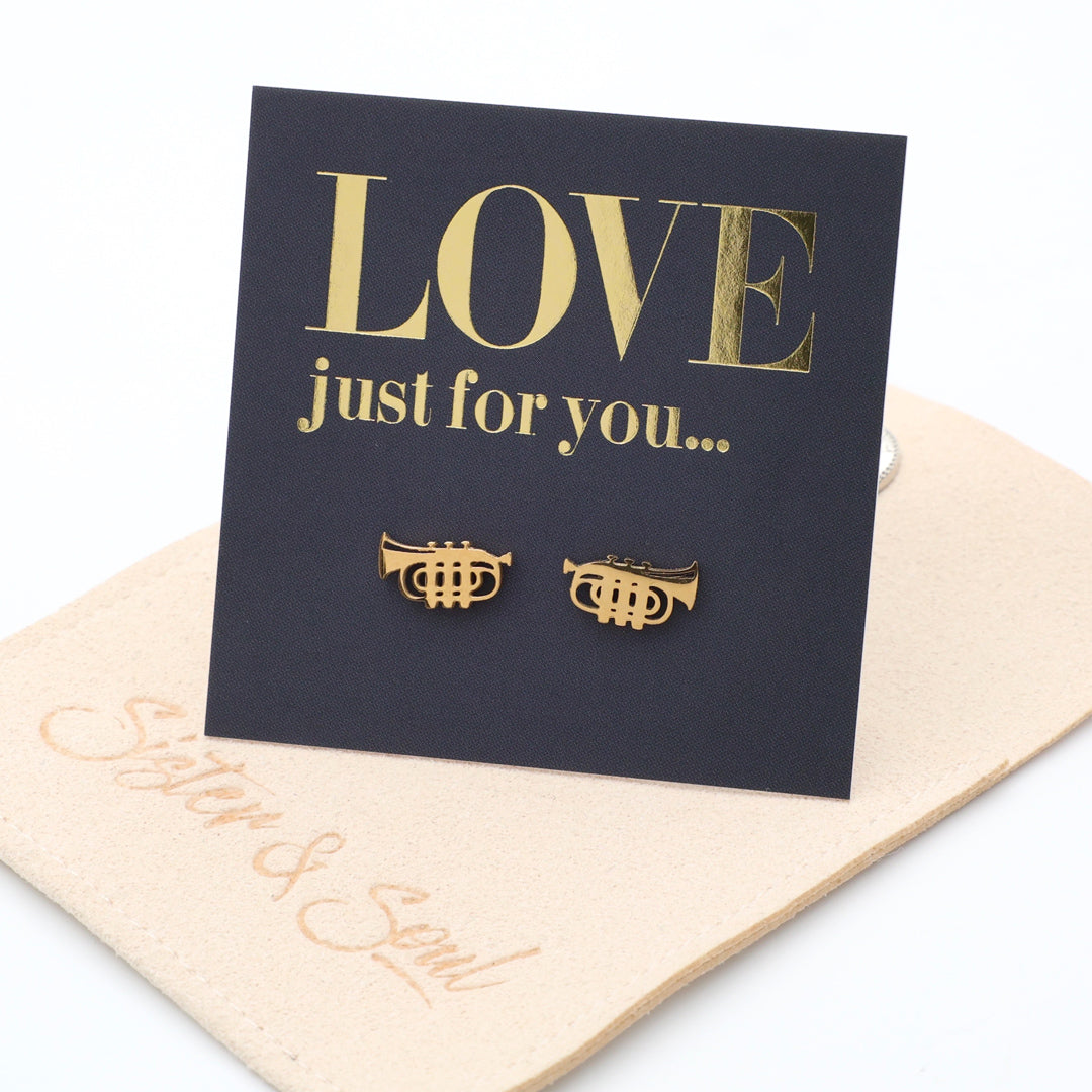 Gold earrings trumpet on a 'LOVE just for you' card with a beige envelope