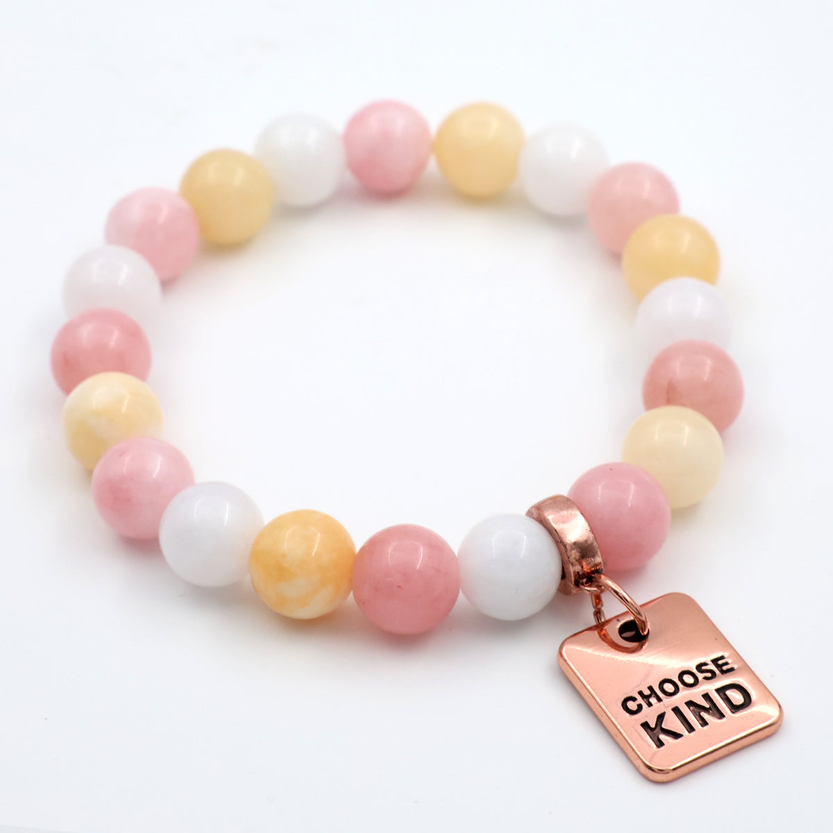 Beaded bracelet with 'Choose Kind' charm on a white background